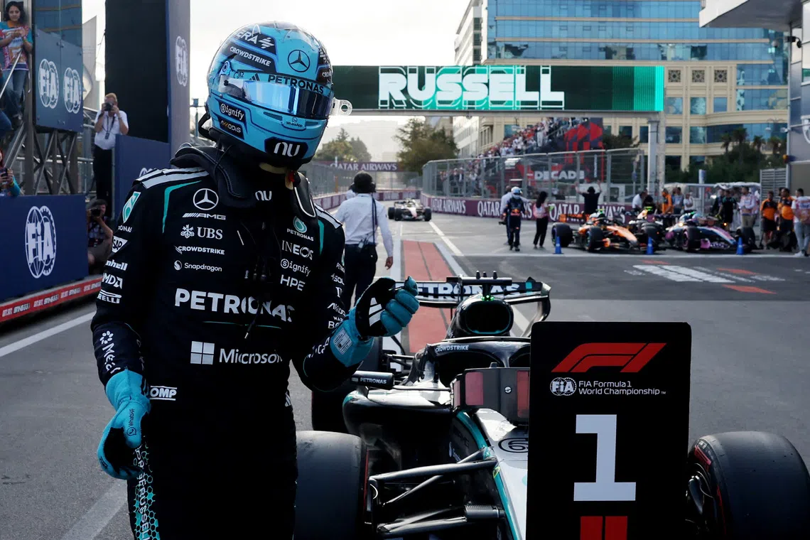 Formula One F1 - Azerbaijan Grand Prix - Baku City Circuit, Baku, Azerbaijan - September 25, 2026 Mercedes' George Russell celebrates after qualifying in pole position REUTERS/Jakub Porzycki