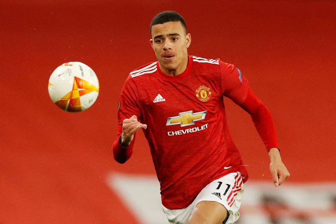FILE PHOTO: Soccer Football - Europa League - Round of 16 First Leg - Manchester United v AC Milan - Old Trafford, Manchester, Britain - March 11, 2021 Manchester United's Mason Greenwood in action REUTERS/Phil Noble/File Photo