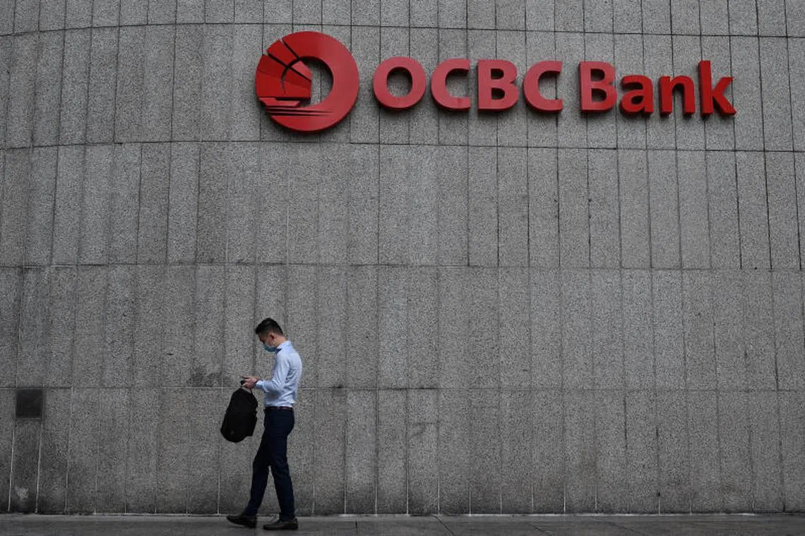 Net profit at OCBC by assets rose to $1.31 billion for the three months to December from a year earlier.