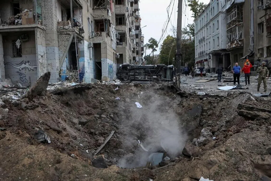 FILE PHOTO: A crater is seen at the site of a Russian missile strike, amid Russia's attack on Ukraine, in Kharkiv, Ukraine October 6, 2023. REUTERS/Sofiia Gatilova/File Photo