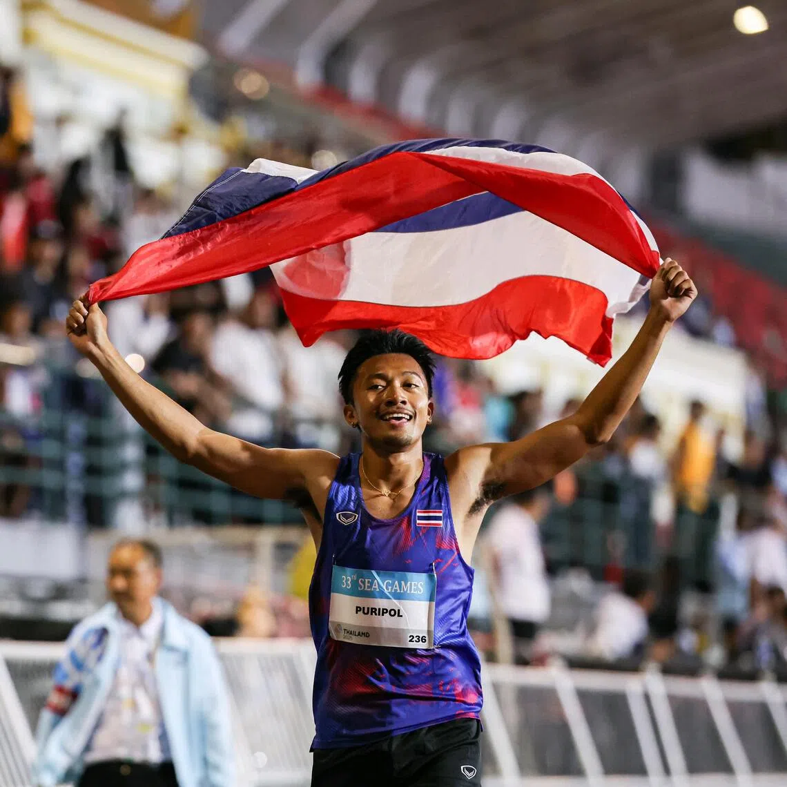 Thai sprinter Boonson Puripol celebrating after winning the 100m final at the SEA Games in Bangkok on Dec 11, 2025.