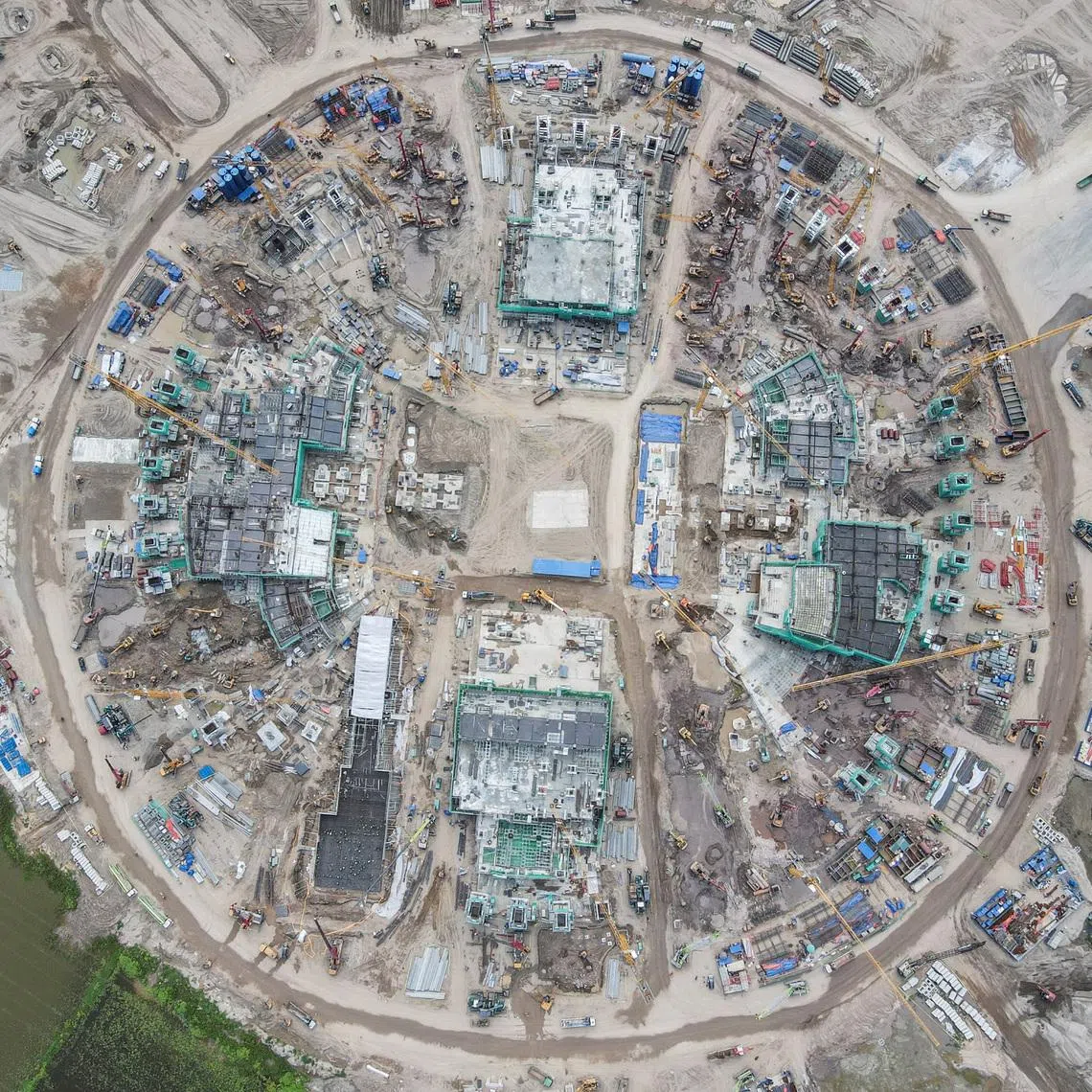 A drone view shows construction work at Hung Vuong Stadium, a planned 135,000-seat football stadium, in Hanoi, Vietnam, on June 8.