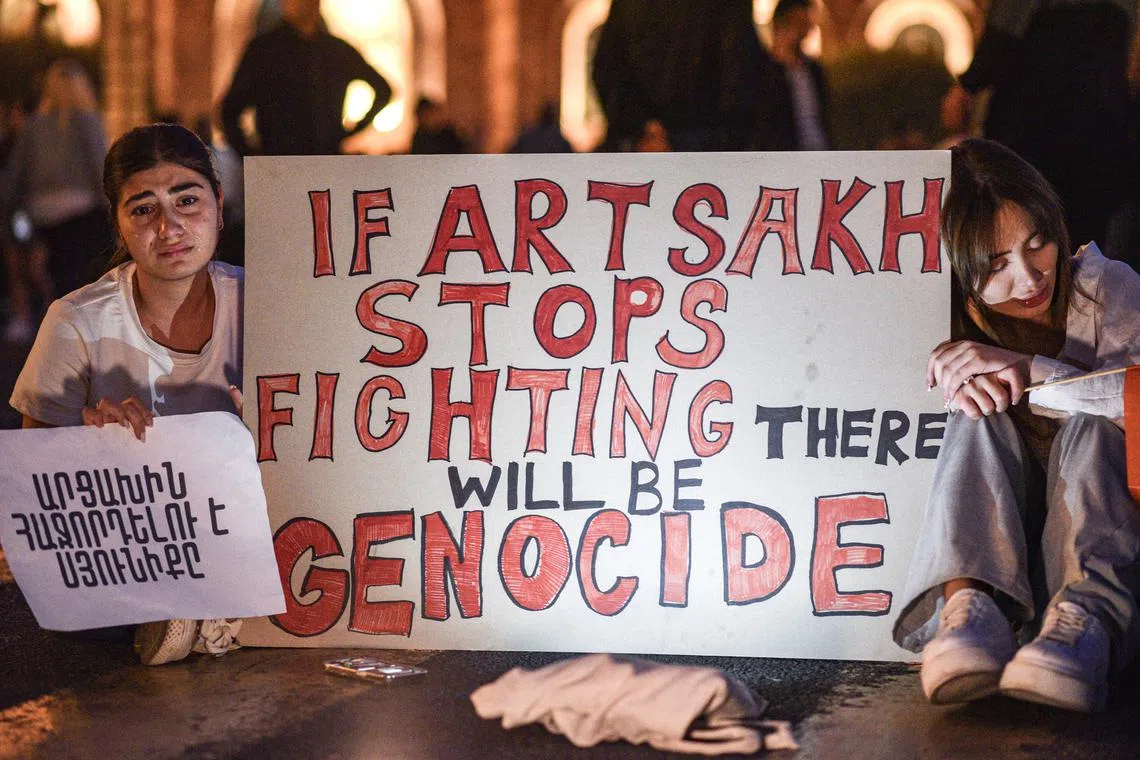 Armenian people during a protest against their government's handling of the situation in Nagorno-Karabakh region, in, Armenia, on Sept 20.