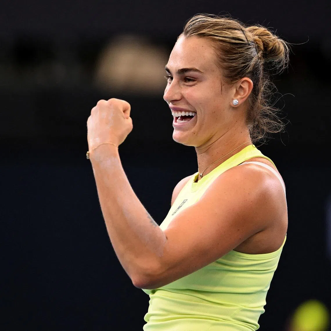 Tennis - Brisbane International Tennis Tournament - Queensland Tennis Centre, Brisbane, Australia - January 4, 2026 Belarus' Aryna Sabalenka reacts during her women's doubles round of 16 match with Spain's Paula Badosa against China's Zhang Shuai and Russia's Liudmila Samsonova ZAIN MOHAMMED/AAP Image via REUTERS