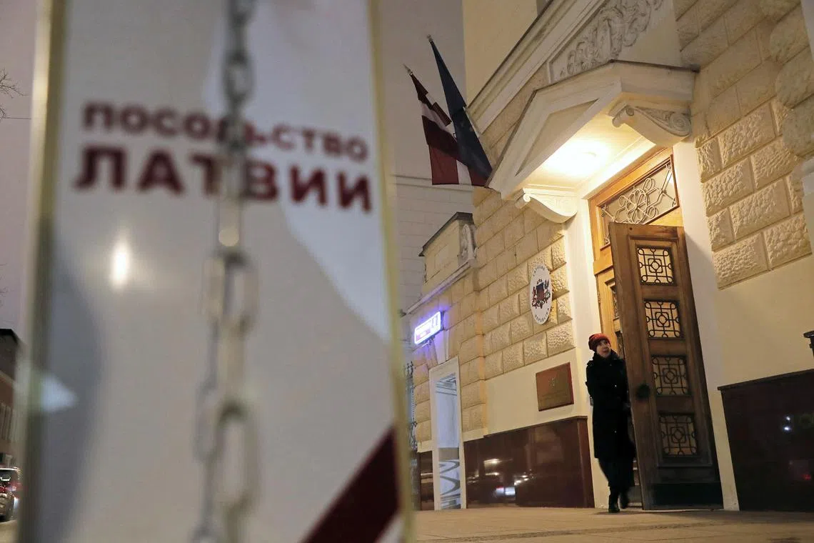 Russia’s foreign ministry summoned the Latvian charge d’affaires to protest over Riga’s decision to downgrade relations with Russia.