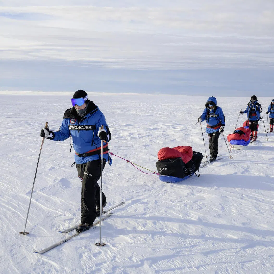 The Before It’s Gone (BIG) Arctic Research Expedition team pulling sledges
