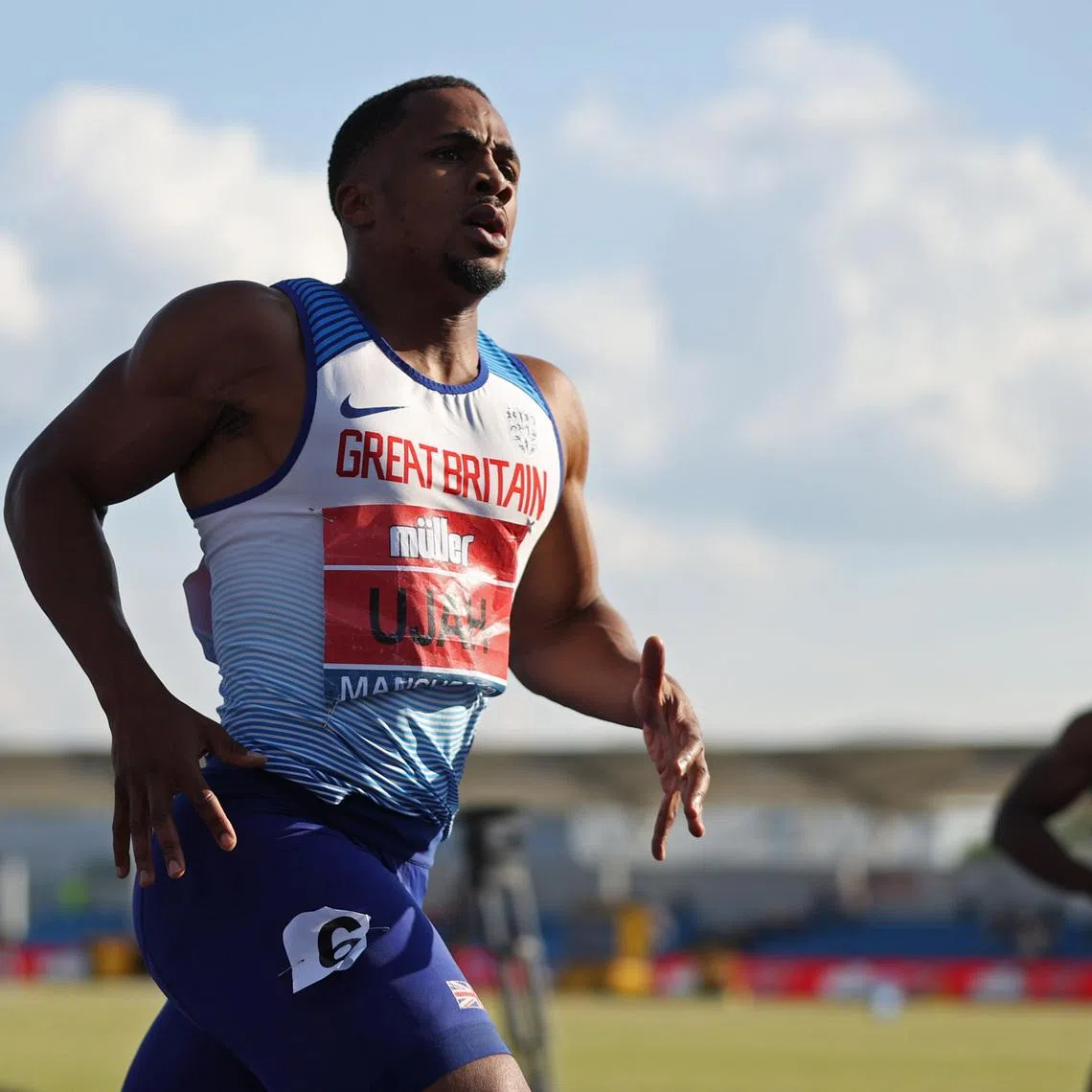 Athletics - British Athletics Championships - Manchester Regional Arena, Manchester, Britain - June 26, 2021 Britain’s Chijindu Ujah after winning the men's 100m final Action Images via Reuters/Molly Darlington