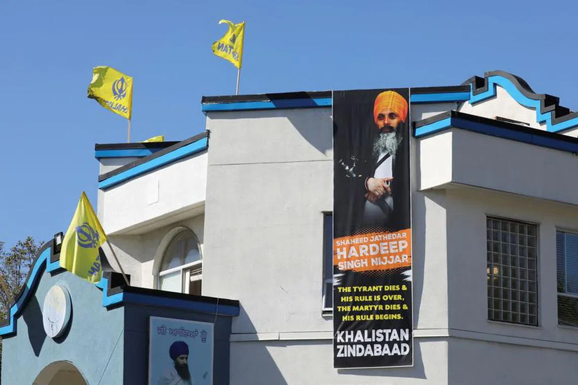 A sign outside the Guru Nanak Sikh Gurdwara temple is seen after the killing on its grounds in June 2023 of Sikh leader Hardeep Singh Nijjar, in Surrey, British Columbia, Canada September 18, 2023.  REUTERS/Chris Helgren