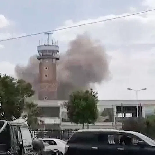 Smoke rising from the airport in Sanaa after it was purportedly struck by Yemen’s internationally-recognised government on July 13.