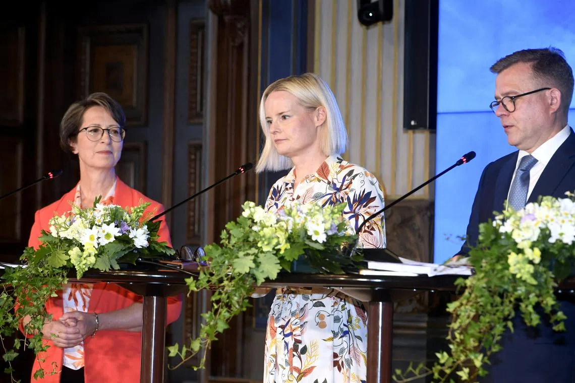 Christian Democrats chair Sari Essayah, The Finns Party chair Riikka Purra and National Coalition Party chair PM-designate Petteri Orpo attend a press conferance, where the four-party cabinet released the details of the governing agenda, in Helsinki, Finland, June 16, 2023. Lehtikuva/Kimmo Penttinen via REUTERS  ATTENTION EDITORS - THIS IMAGE WAS PROVIDED BY A THIRD PARTY. NO THIRD PARTY SALES. NOT FOR USE BY REUTERS THIRD PARTY DISTRIBUTORS. FINLAND OUT. NO COMMERCIAL OR EDITORIAL SALES IN FINLAND.