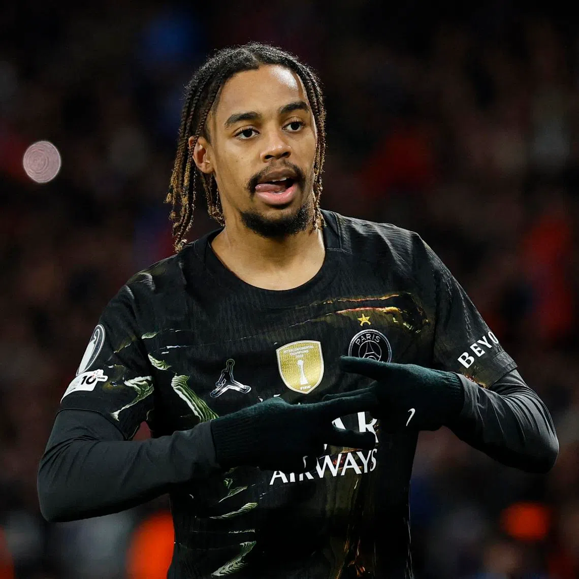 Soccer Football - UEFA Champions League - Round of 16 - First Leg - Paris St Germain v Chelsea - Parc des Princes, Paris, France - March 11, 2026 Paris St Germain's Bradley Barcola celebrates scoring their first goal Action Images via Reuters/Peter Cziborra