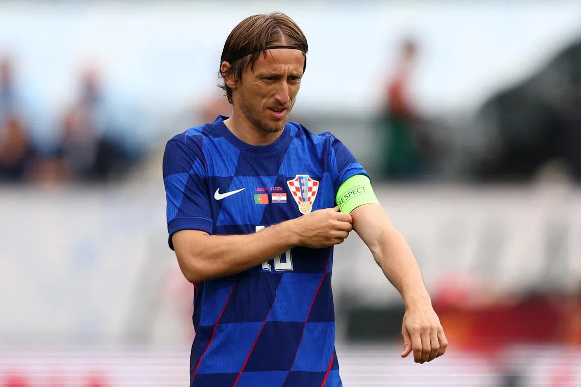Soccer Football - International Friendly - Portugal v Croatia - Centro Desportivo Nacional do Jamor, Oeiras, Portugal - June 8, 2024 Croatia's Luka Modric reacts before scoring their first goal REUTERS/Pedro Nunes/ File Photo