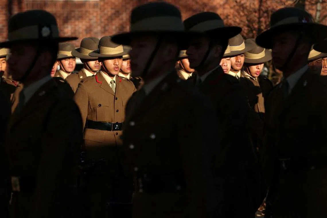 FILE PHOTO: Soldiers from the Brigade of Gurkhas march on the Parade Ground during a passing out ceremony at Catterick Garrison near Richmond, Britain, November 23, 2023. REUTERS/Phil Noble/POOL/File Photo