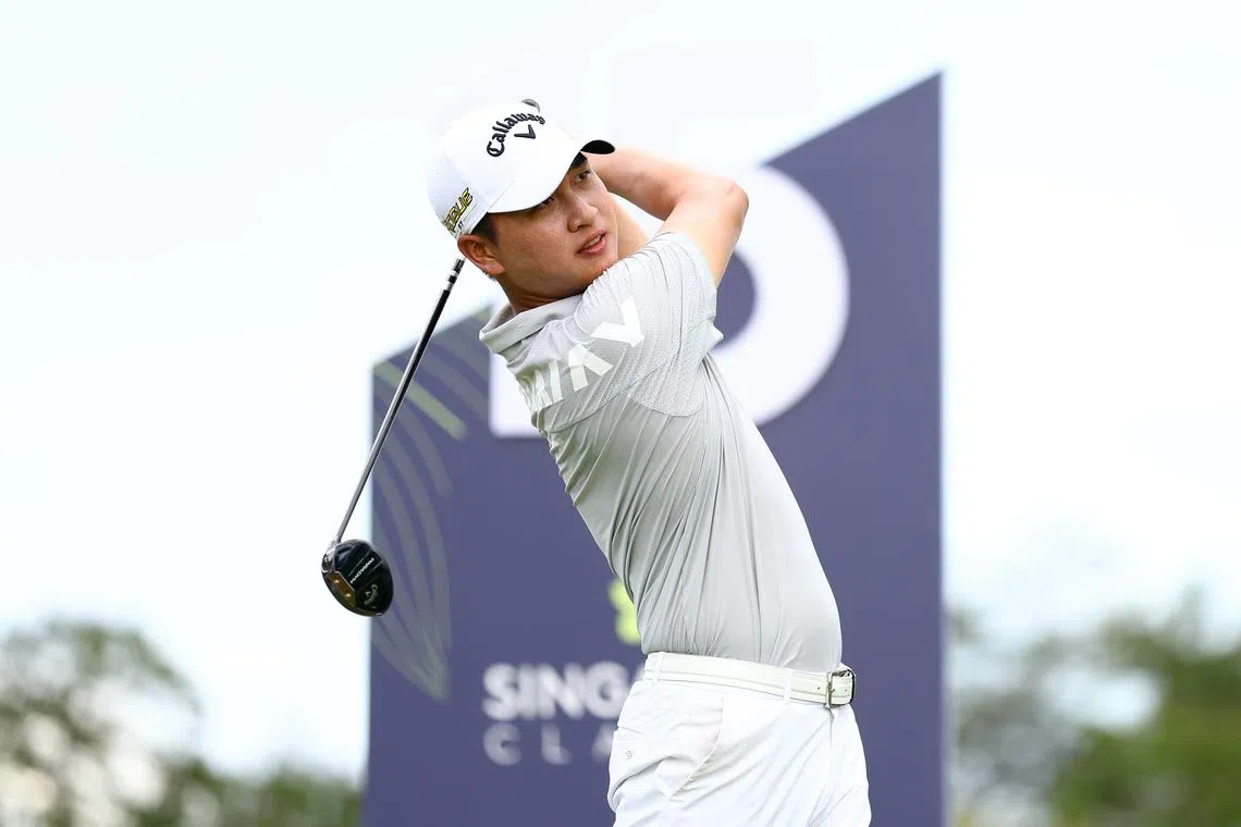 SINGAPORE, SINGAPORE - FEBRUARY 11: Jeunghun Wang of South Korea plays his shot from the 15th tee during Day Three of the Singapore Classic at Laguna National Golf Resort Club on February 11, 2023 in Singapore. (Photo by Yong Teck Lim/Getty Images)