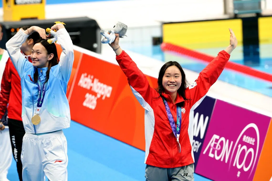 Singapore’s Gan Ching Hwee celebrates an unexpected Asian Games women’s 400m freestyle silver and national record.
