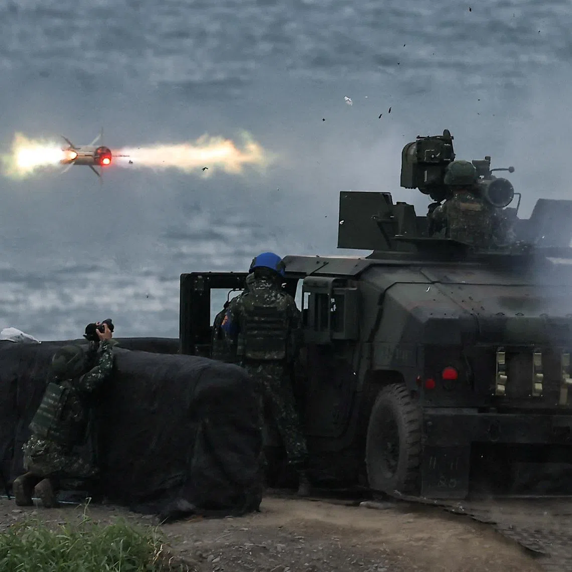 A US-made TOW-2A wire-guided anti-tank missile is launched by Taiwanese soldiers from a M1167 TOW carrier vehicle at the Fangshan training grounds in Pingtung, Taiwan, August 26, 2024. REUTERS/Ann Wang/File Photo