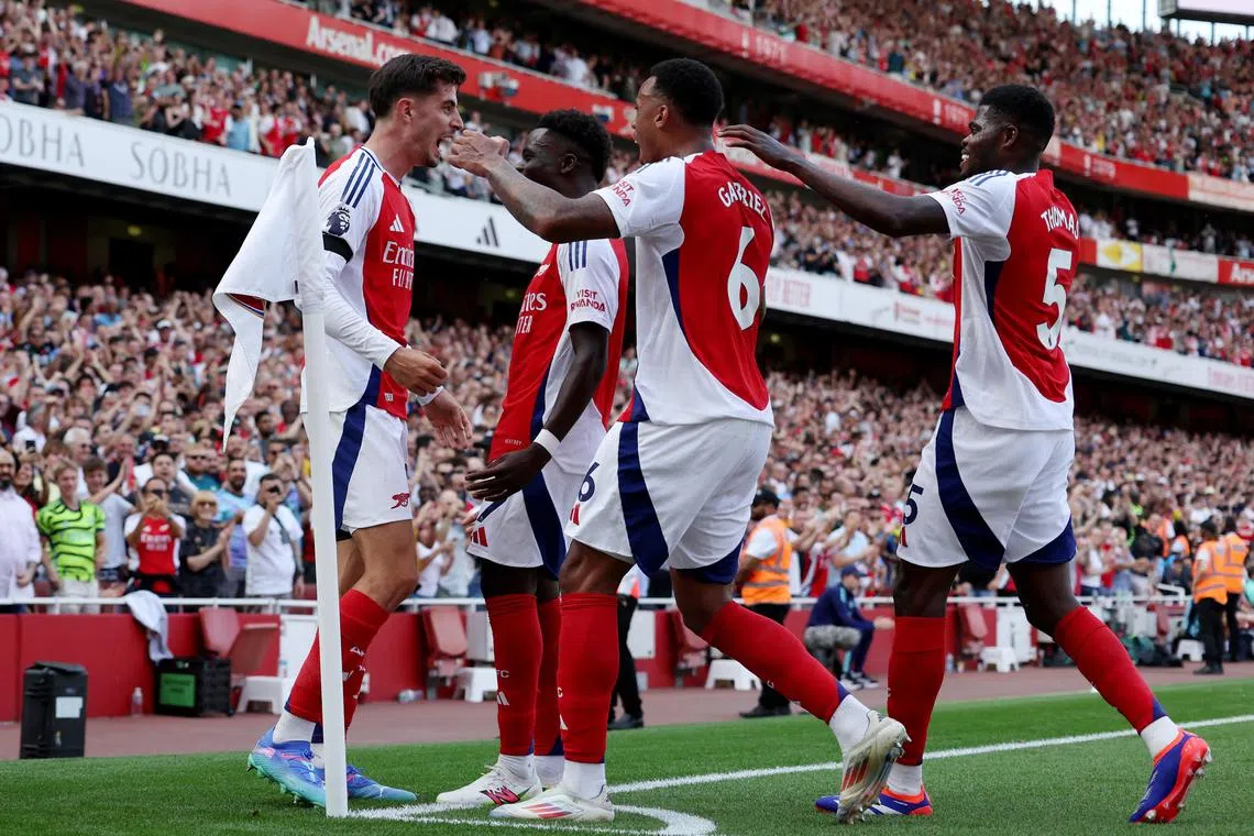 Arsenal's Kai Havertz celebrates scoring their first goal against Wolverhampton Wanderers with Bukayo Saka, Gabriel Magalhaes and Thomas Partey. 