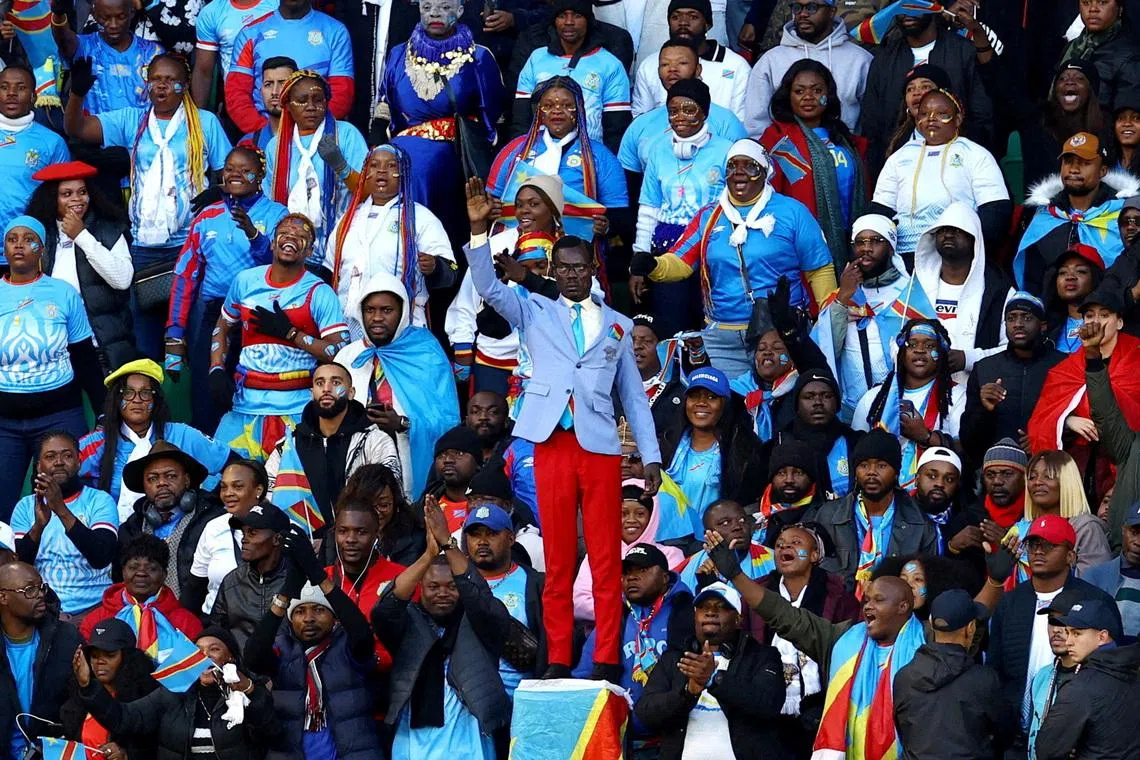 Democratic Republic of Congo fan Michel Nkuka Mboladinga is known for posing as a statue of the country’s independence hero Patrice Lumumba.