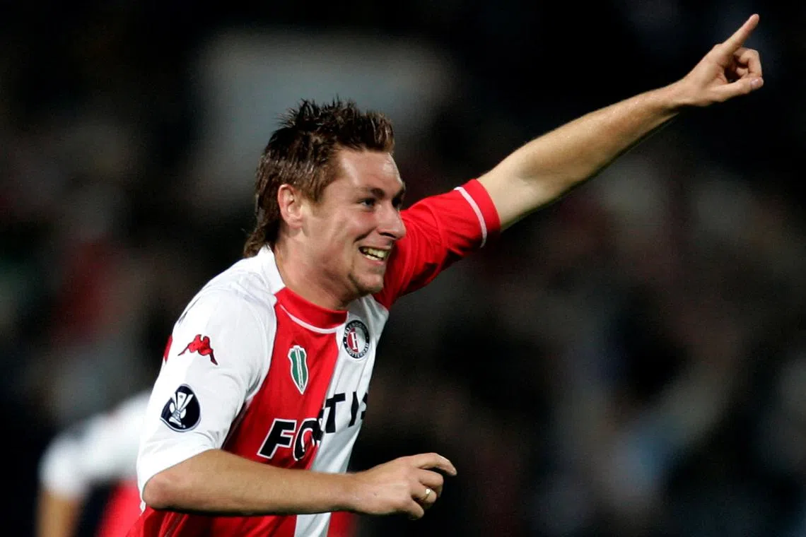 FILE PHOTO: Feyenoord's  Pascal Bosschaart celebrates after scoring 1 - 0 in the first minute against Odd Grenland during the UEFA Cup first round, second leg soccer match at the Feyenoord Stadium In Rotterdam September 30, 2004.          REUTERS/Jerry Lampen/File Photo