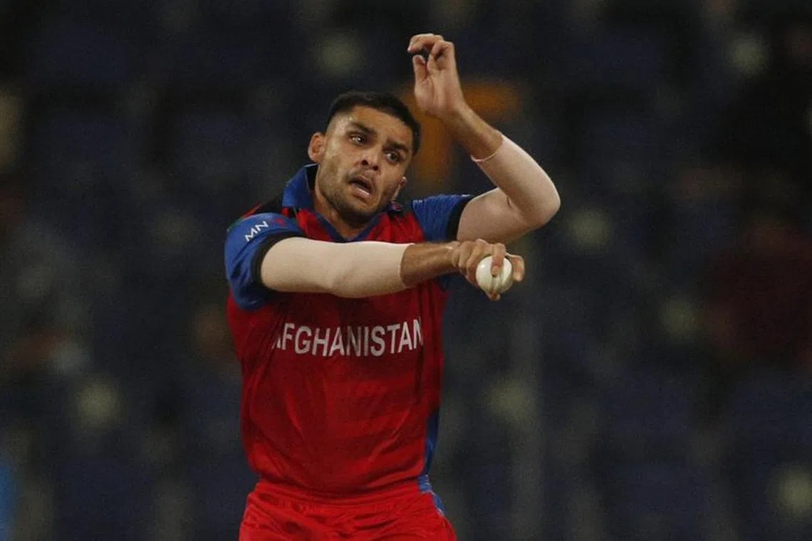 Cricket - ICC Men's T20 World Cup - Super 12 - Group 2 - India v Afghanistan - Sheikh Zayed Cricket Stadium, Abu Dhabi, United Arab Emirates - November 3, 2021 Afghanistan's Naveen-ul-Haq in action REUTERS/Hamad I Mohammed