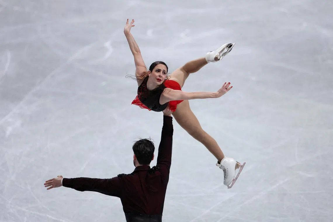 FILE PHOTO: Figure Skating - ISU Grand Prix of Figure Skating - Grand Prix Final - Aichi International Arena, Nagoya, Japan - December 5, 2025 Canada's Deanna Stellato-Dudek and Maxime Deschamps perform during the pairs free skating REUTERS/Issei Kato/File Photo