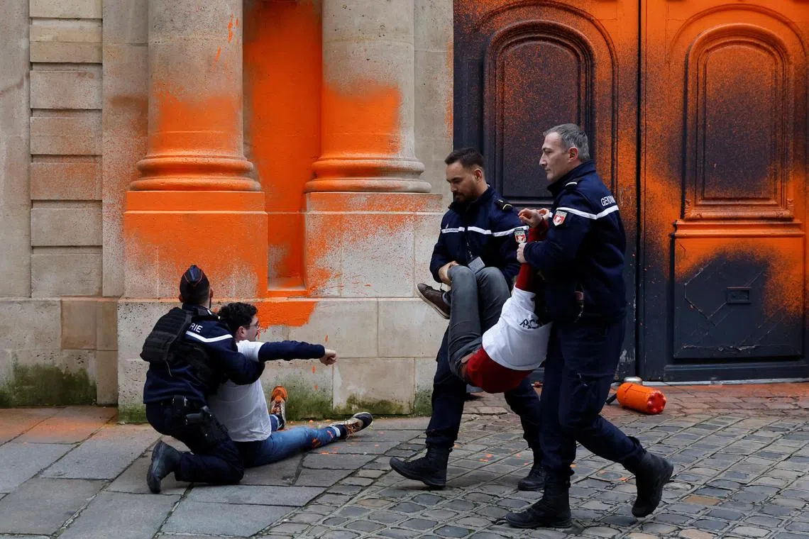 Two climate activists spray-painted the front entrance of the French prime minister’s office on Wednesday in protest at what campaign group Derniere Renovation (Last Renovation) called “climate crimes” committed by the state.