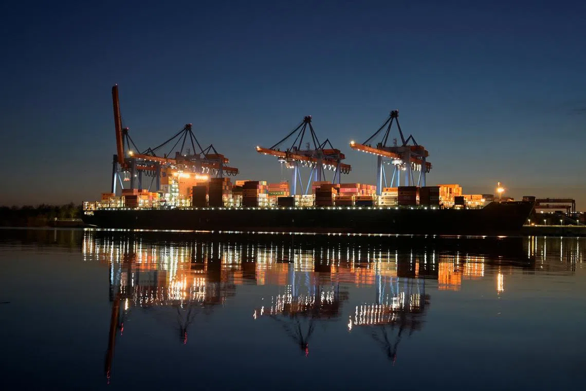 A container ship is seen at the loading terminal \"Altenwerder\" in the port of Hamburg, Germany, February 17, 2025. REUTERS/Fabian Bimmer/File Photo