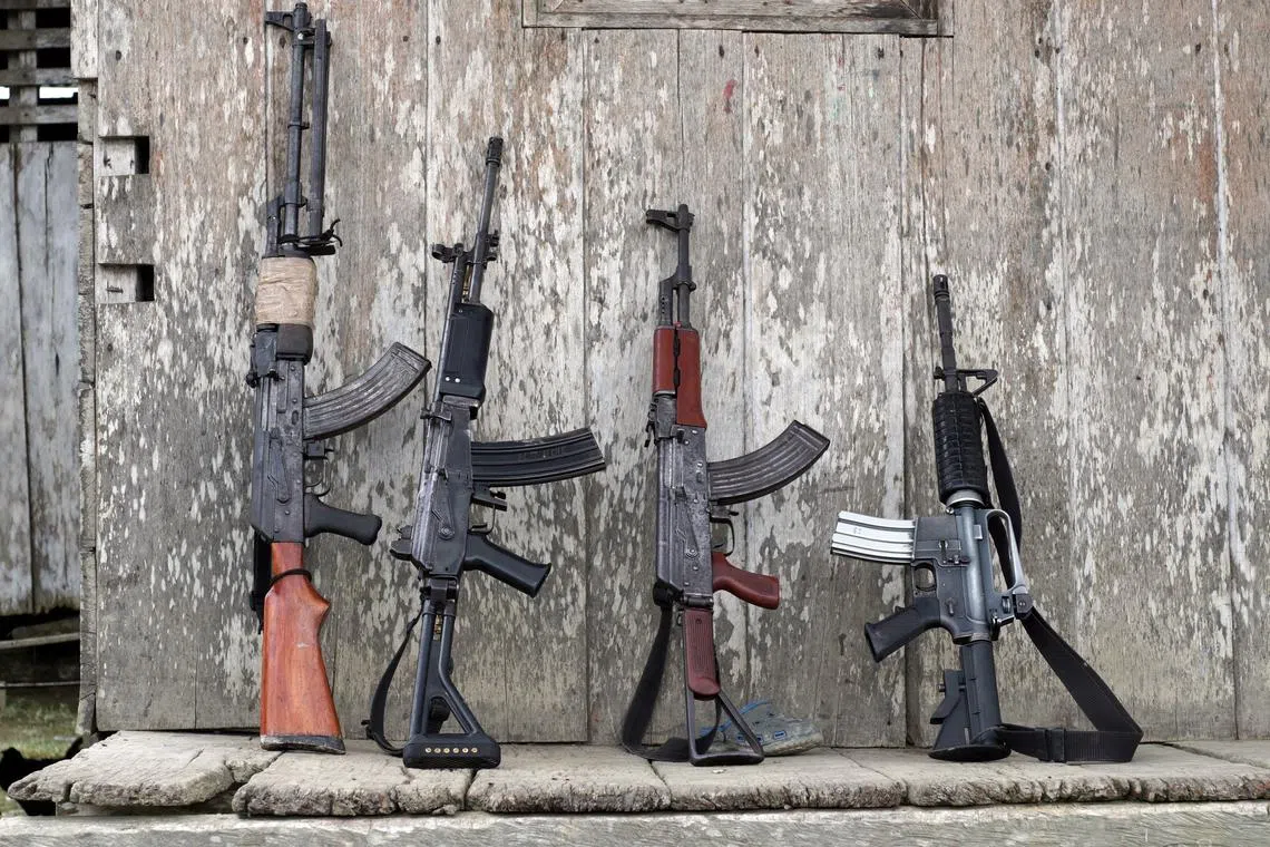 The weapons of rebels of Colombia's Marxist National Liberation Army (ELN) lean against a wall of a farmer's home, in the northwestern jungles, Colombia August 31, 2017. Picture taken August 31, 2017. REUTERS/Federico Rios/ File Photo