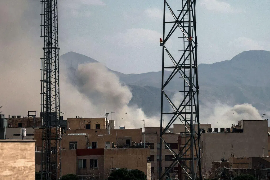 A plume of smoke rises following a reported explosion in Tehran on Feb 28. The EU described developments across the Middle East as "perilous", after Israel and the US launched strikes on Iran.