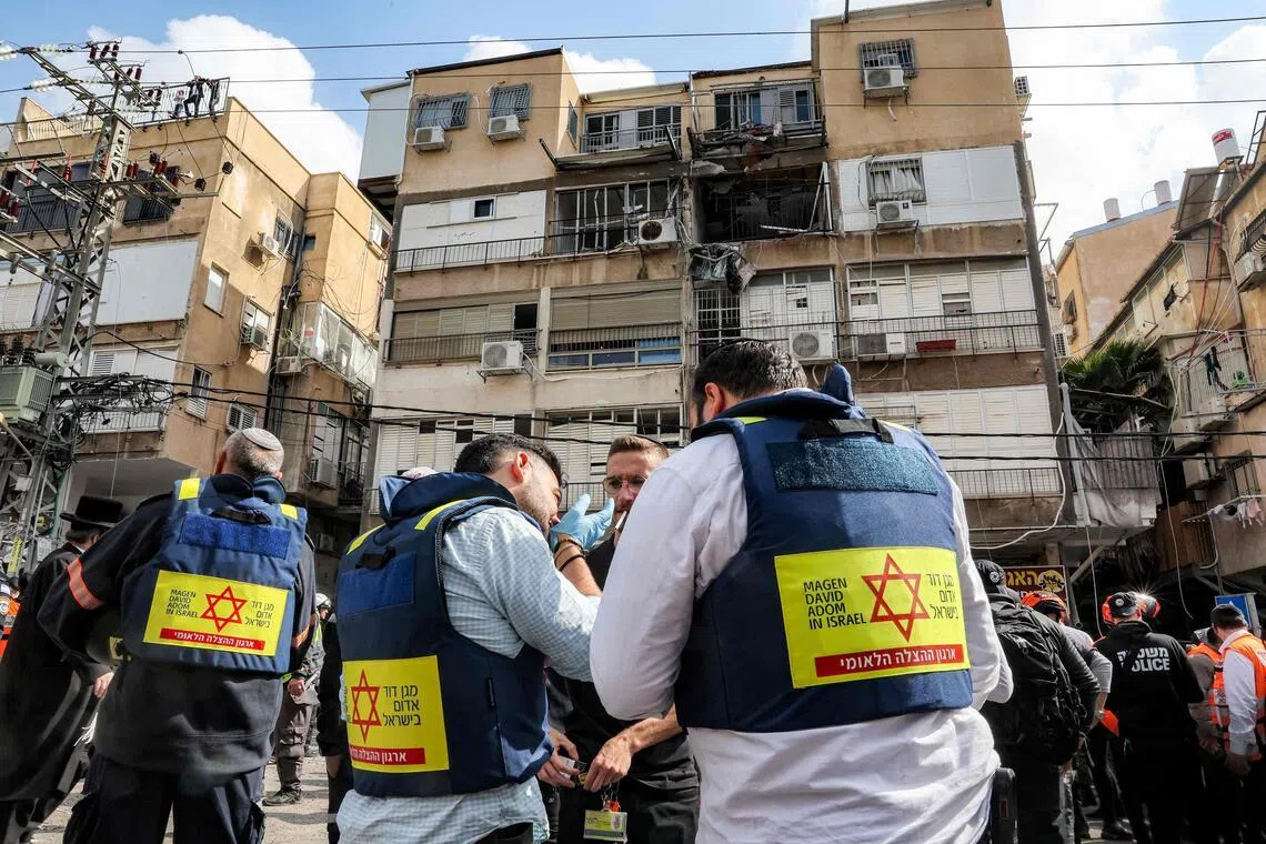 A building hit by an Iranian projectile strike at a residential neighbourhood in Bnei-Brak, on the eastern outskirts of Tel Aviv, on March 15.