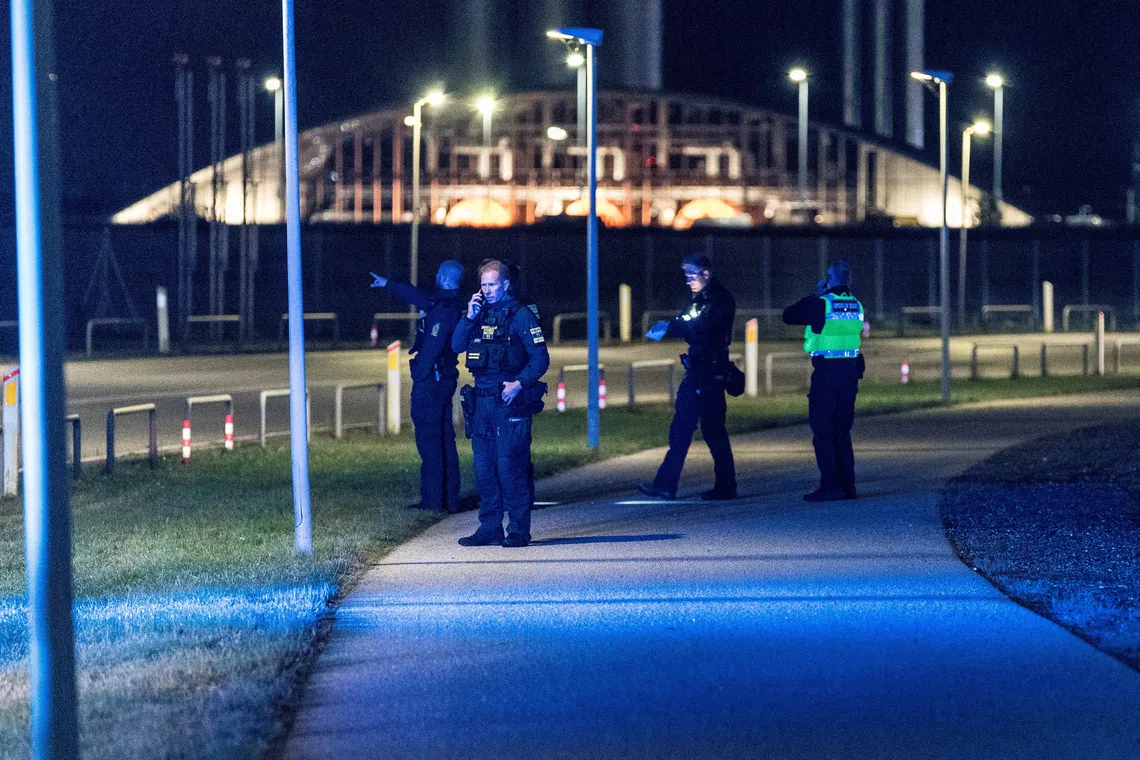 Police officers walk after all traffic has been closed at the Copenhagen Airport due to drone reports in Copenhagen, Denmark September 22, 2025. Ritzau Scanpix/Steven Knap via REUTERS