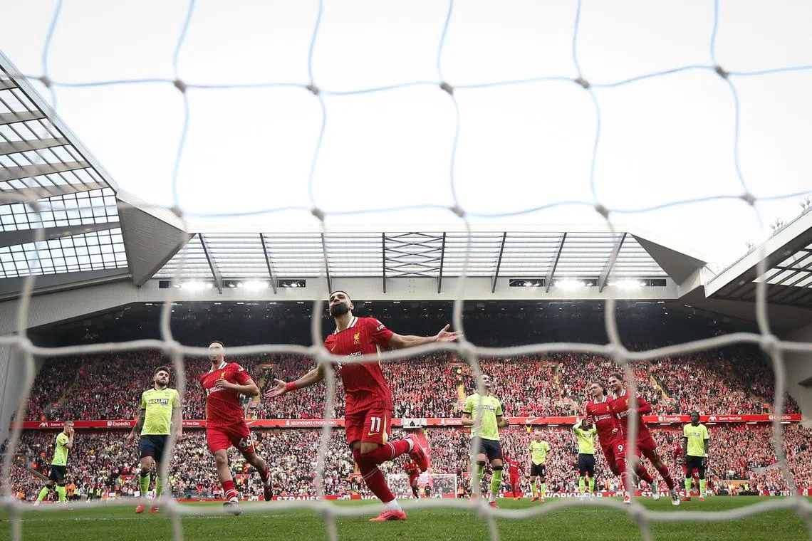 Liverpool's Mohamed Salah celebrates scoring his team's second goal against  Southampton from the penalty spot.