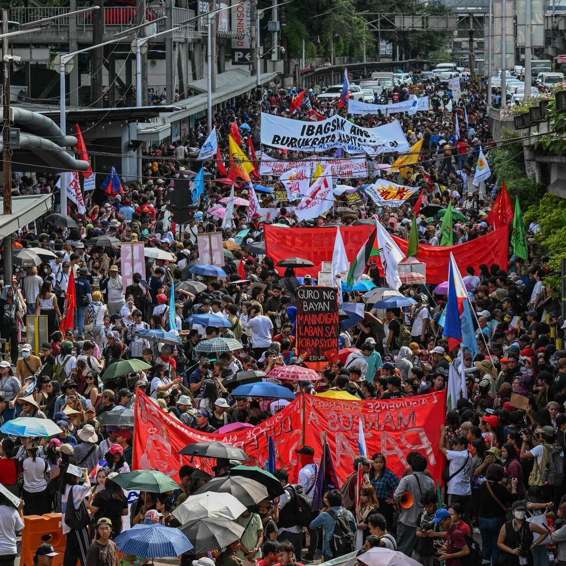A protest in Quezon City, the Philippines, on Feb 25, commemorating the 40th anniversary of the 1986 People Power Revolution, which overthrew the late dictator Ferdinand Marcos Sr.