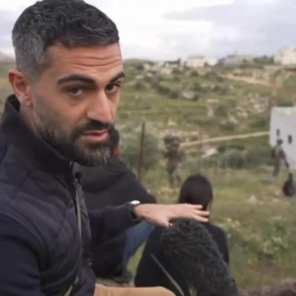 CNN journalist Jeremy Diamond addresses the camera as his team is approached by Israeli soldiers.
