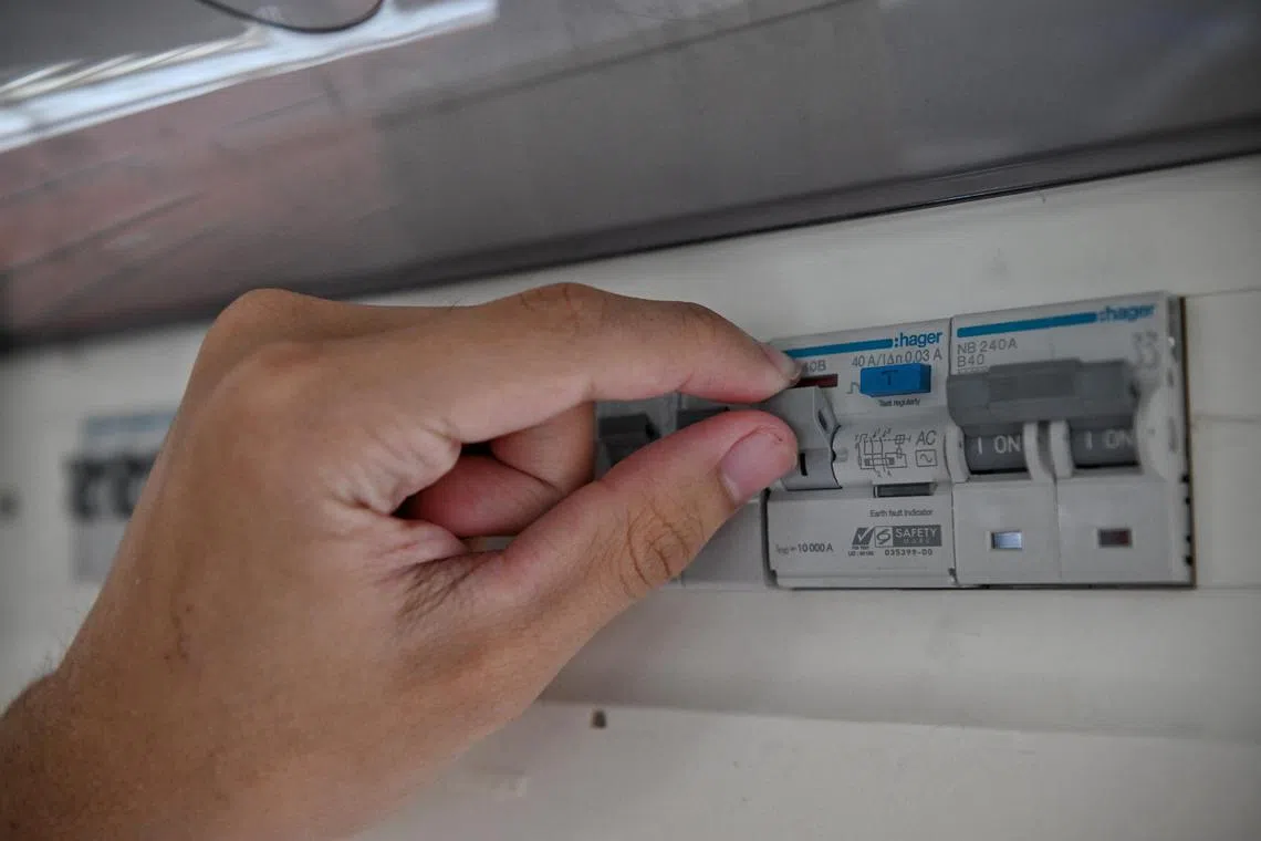 A residual current circuit breaker prevents electric shocks by cutting off the electricity supply when it detects a current leak.