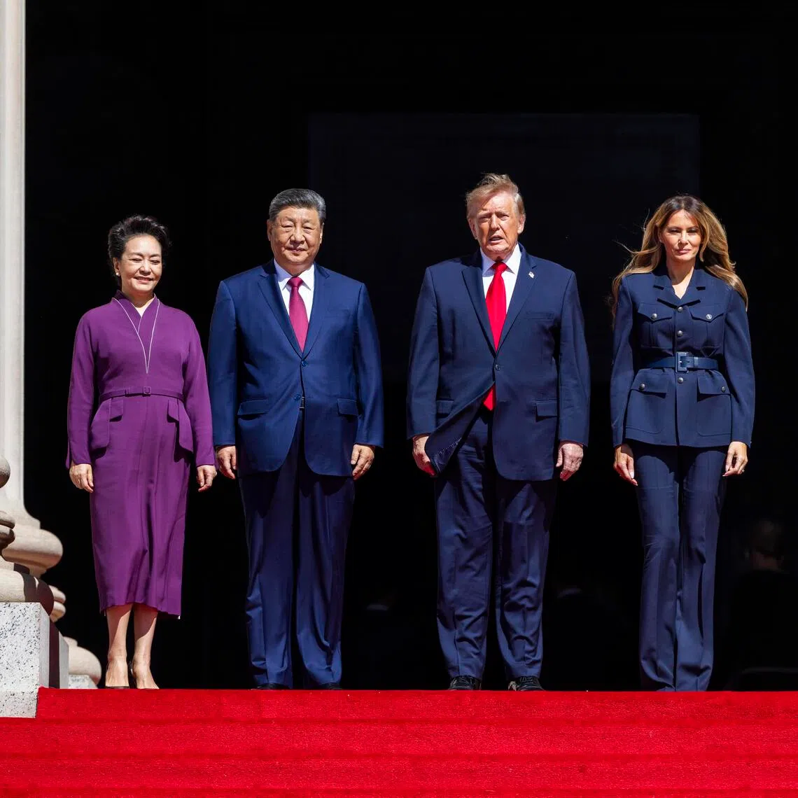 US President Donald Trump (centre, right) and First Lady Melania Trump (right) escorting Chinese President Xi Jinping and First Lady of China Peng Liyuan on a tour of the National Archives in Washington, DC, on Sept 25.