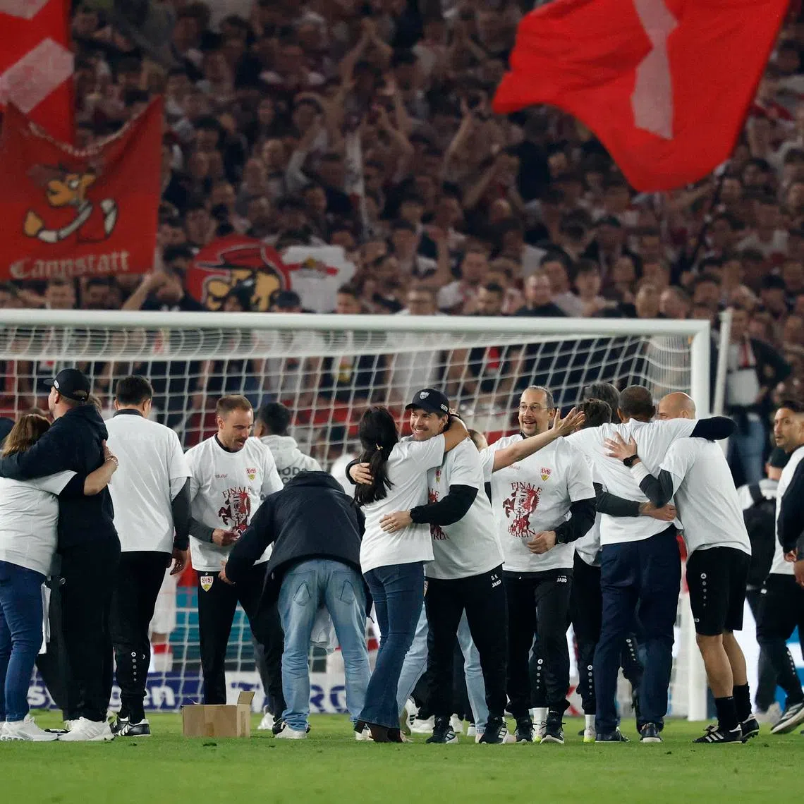 Soccer Football - DFB Cup - Semi Final - VfB Stuttgart v SC Freiburg - MHPArena, Stuttgart, Germany - April 23, 2026 VfB Stuttgart players celebrate with team after the match REUTERS/Heiko Becker