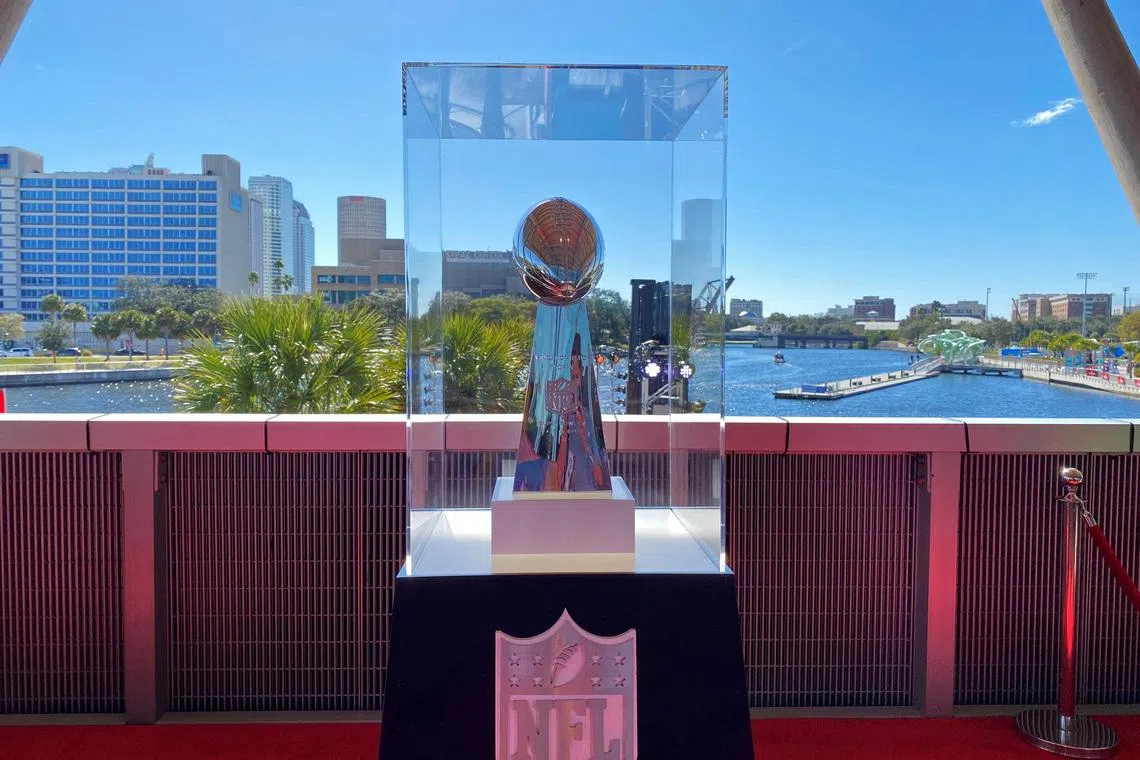 FILE PHOTO: The Vince Lombardi trophy is on display before it is awarded to the winning team of Super Bowl LV in Tampa, Florida, U.S., February 5, 2021. REUTERS/Gabriella Borter/File Photo