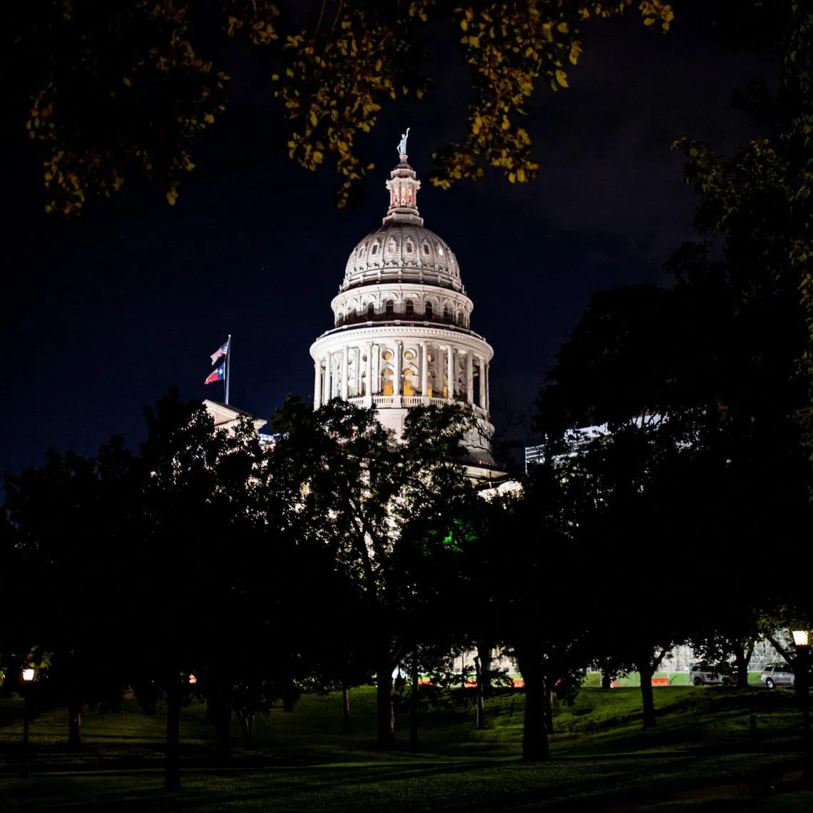 The Texas Capitol is lit during a session in the State Senate, as Republicans attempt to pass an HB 4, a bill that would redraw the state's 38 Congressional Districts, in Austin, Texas, U.S. August 22, 2025. REUTERS/Sergio Flores