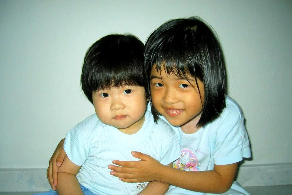 Jade Ow with her younger sister during their childhood.