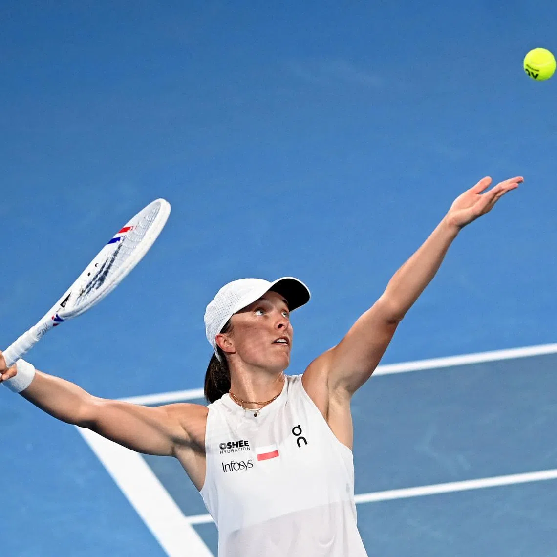 Tennis - United Cup - Final - Poland v Switzerland - Ken Rosewall Arena, Sydney, Australia - January 11, 2026 Poland's Iga Swiatek in action during the singles match against Switzerland's Belinda Bencic REUTERS/Jeremy Piper