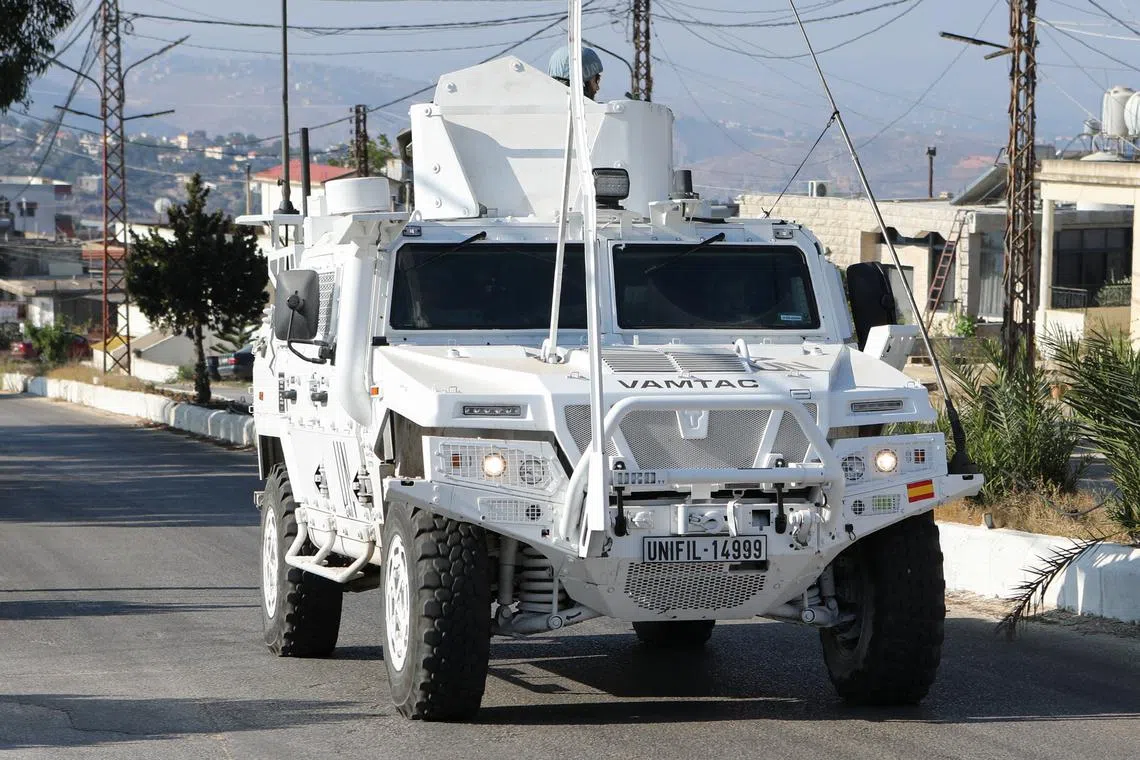 A UN peacekeepers (UNIFIL) vehicle drives in Marjayoun, near the border with Israel, amid ongoing hostilities between Hezbollah and Israeli forces, southern Lebanon October 11, 2024. REUTERS/Karamallah Daher