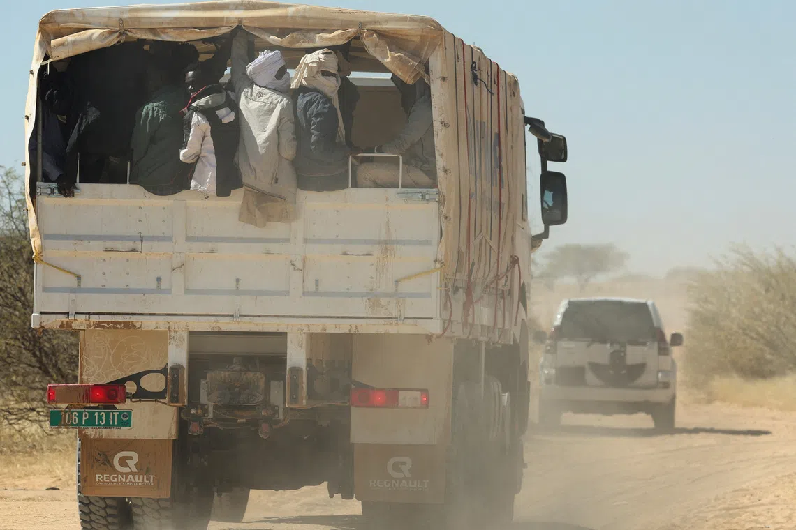 FILE PHOTO: Sudanese refugees from al-Fashir are transported by UNHCR from Tine to the Tuloum refugee camp, following the conflict between the paramilitary Rapid Support Forces (RSF) and the Sudanese army, in eastern Chad, November 21, 2025. REUTERS/Amr Abdallah Dalsh/ File Photo