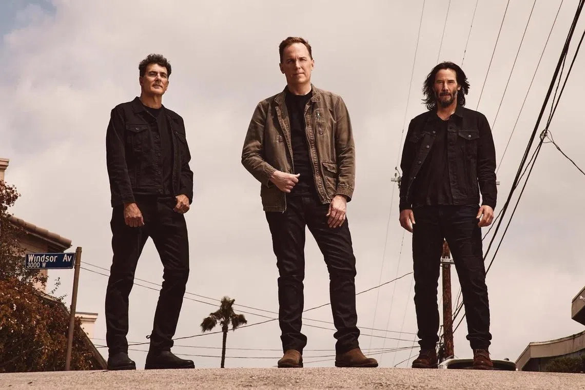 Alt-rock band Dogstar comprise (from left) Robert Mailhouse, Brett Domrose and Keanu Reeves.