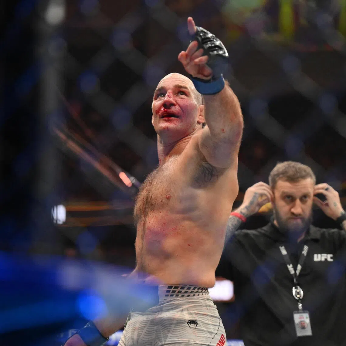 Sean Strickland celebrating after defeating Khamzat Chimaev during UFC 328 at Prudential Center in Newark, New Jersey, on May 9, 2026. He becomes a two-time UFC middleweight champion.