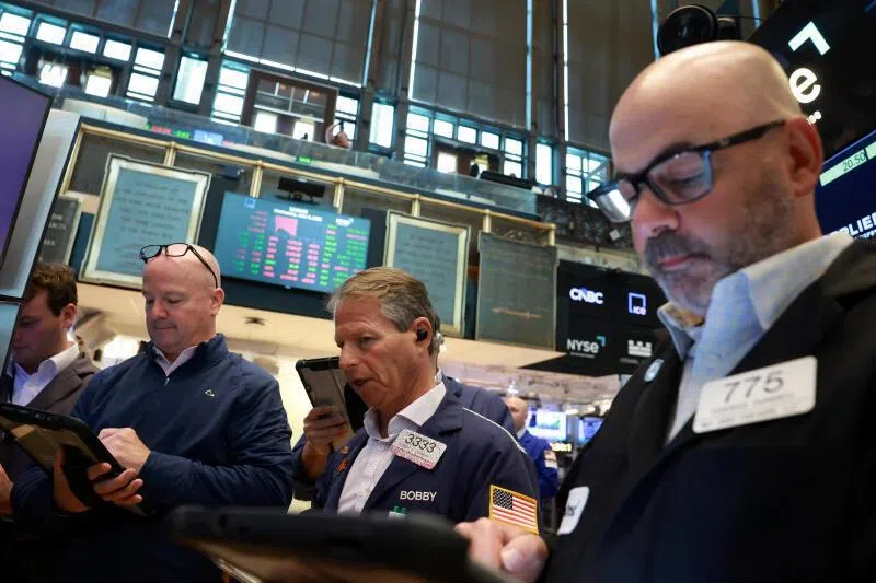 Traders work on the floor at the New York Stock Exchange in New York City, on June 3, 2026.