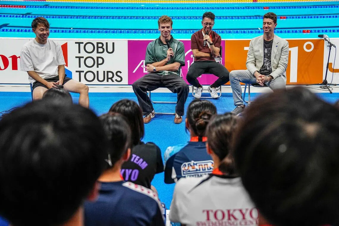 French swimmer Leon Marchand speaks at an event during the 2026 Asian Games at the Tokyo Aquatics Centre on Sept 20.