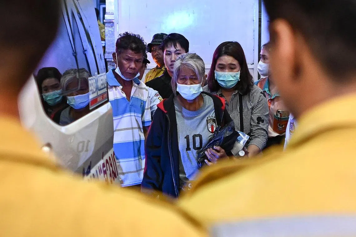 Relatives of the victims gather at the forensic institute of the Police General Hospital in Bangkok on Oct 2, 2024. 