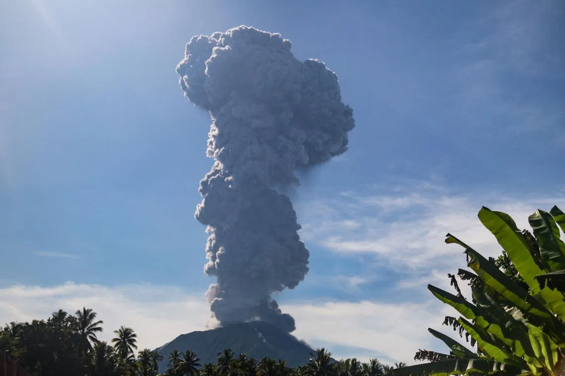 Mount Ibu spewing thick smoke in Gam Ici, North Maluku, on May 13, 2024. A volcano in eastern Indonesia erupted on May 13, spewing a huge ash tower more than five kilometres into the sky after authorities raised its alert level to the second-highest. 