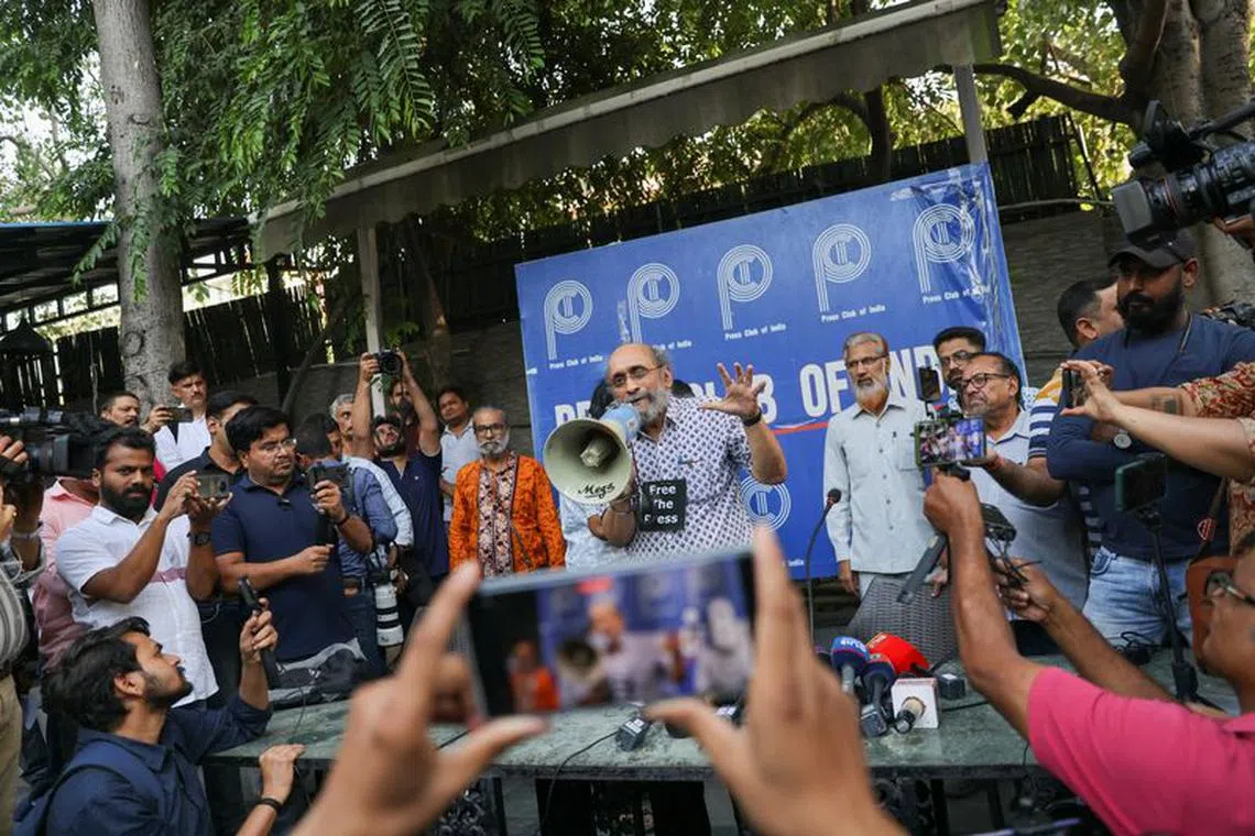 Paranjoy Guha Thakurta, a journalist whose house was raided by the police, speaks to the members of the media at a protest organised at Press Club after the Indian police raided the New Delhi office of a news portal and the homes of journalists and writers linked to it on Tuesday, in New Delhi, India, October 4, 2023. REUTERS/Anushree Fadnavis